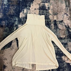 Free people medium turtle neck with slit in back